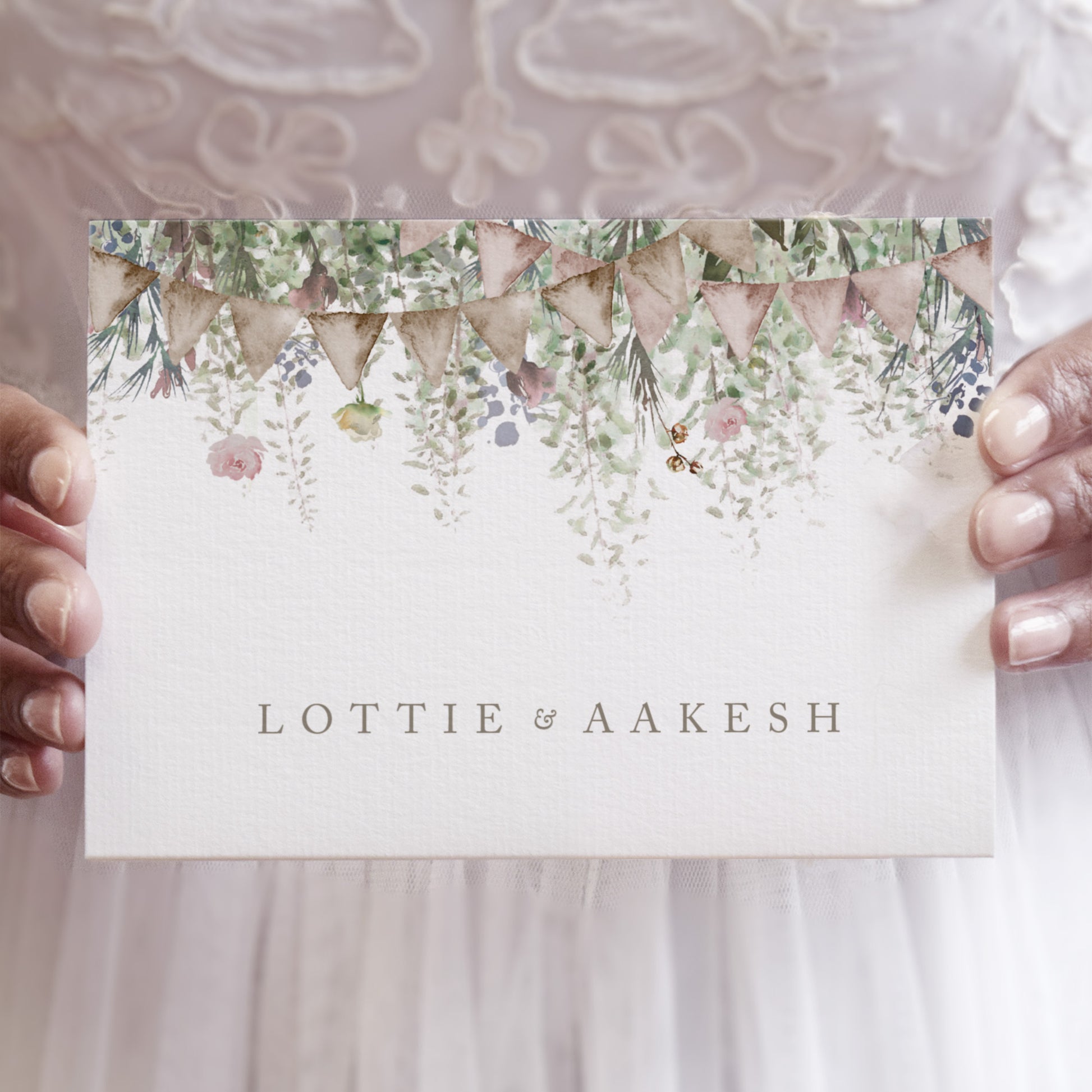 rustic wedding invitations with green foliage and bunting