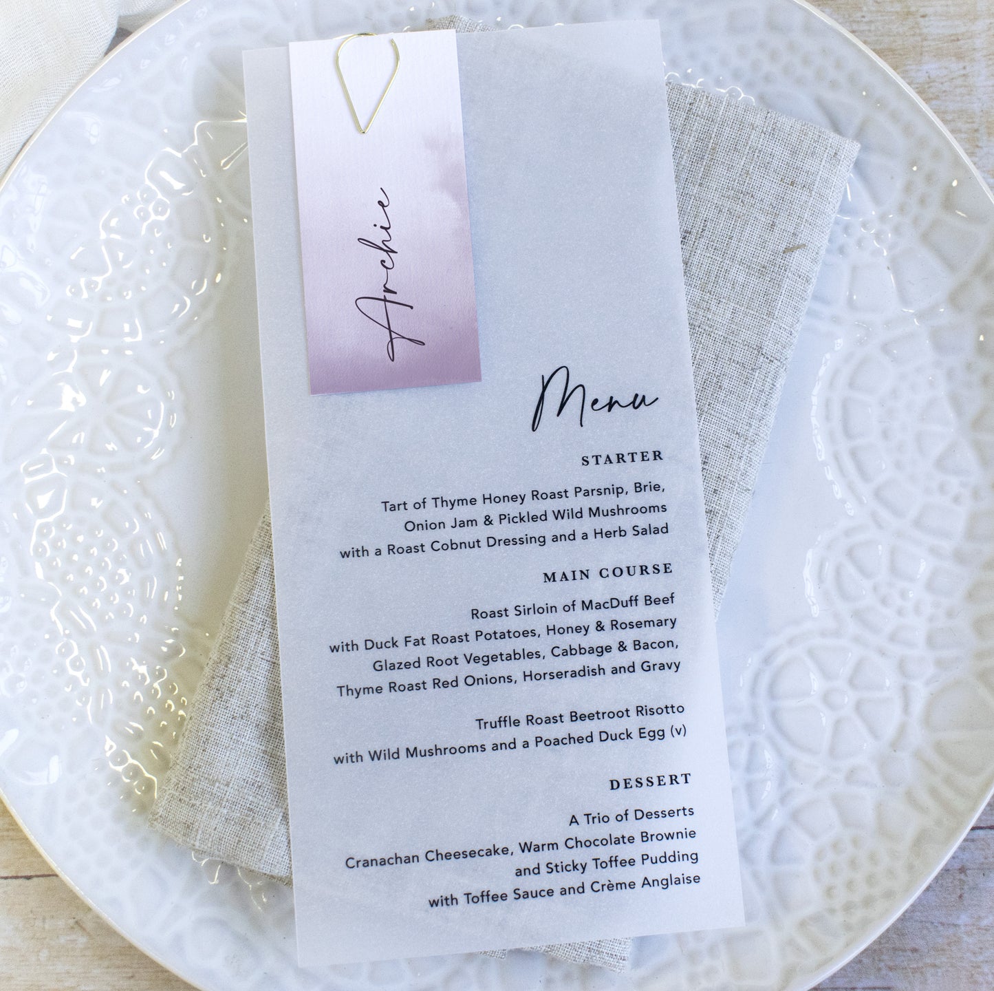 Vellum wedding menu with guest name card in lavender