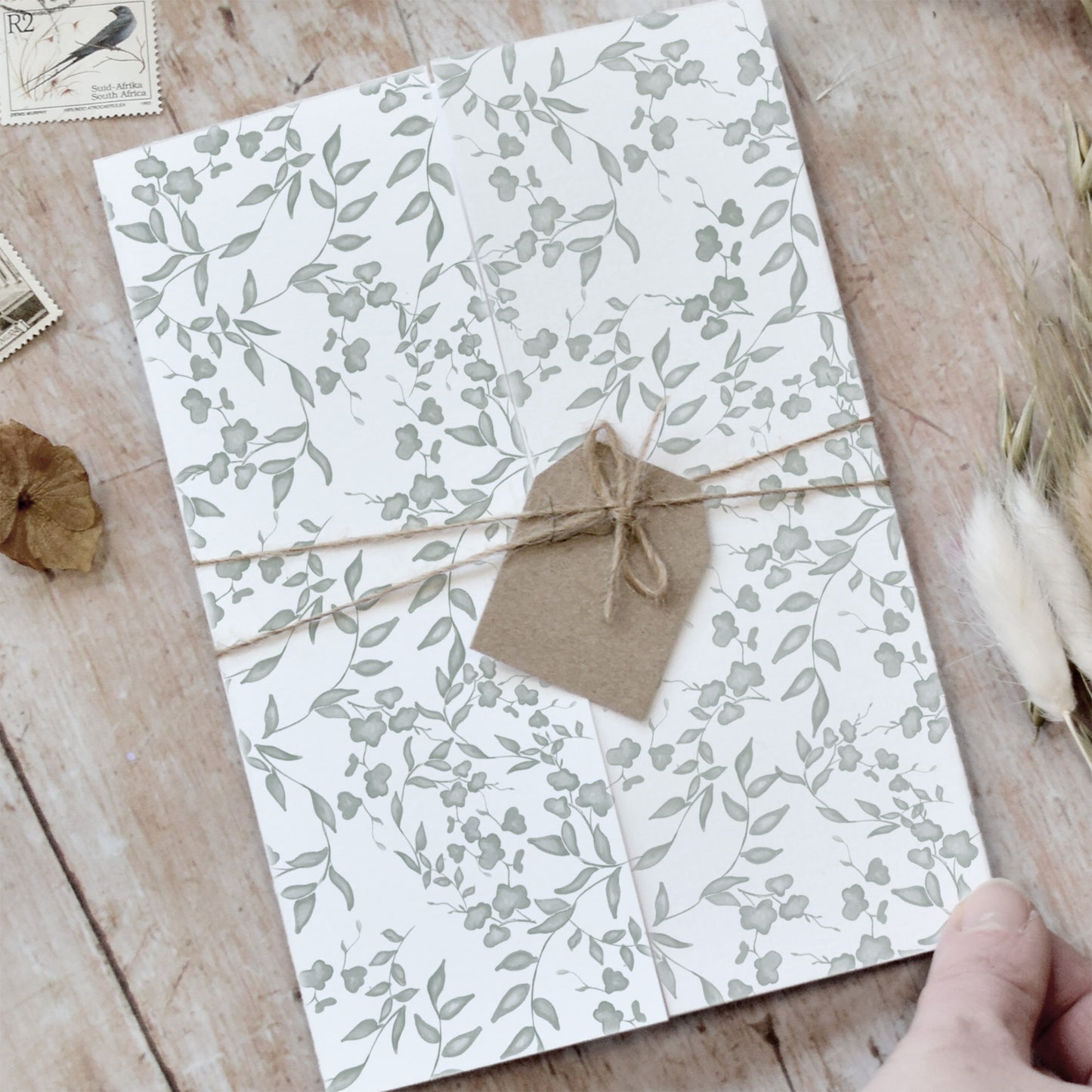 gatefold wedding invitations featuring sage green foliage