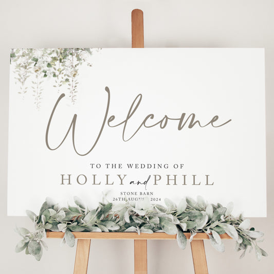 green foliage wedding welcome board