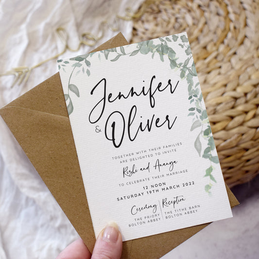'Greenery' wedding postponement cards featuring eucalyptus and modern typography