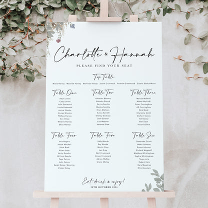 Autumn wedding table plan with sage green leaves
