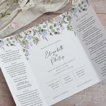 gatefold wedding invitations featuring foliage and wildflowers for a rustic wedding
