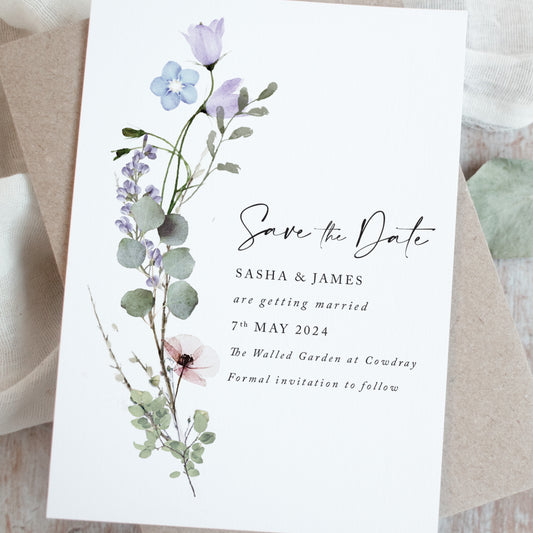 Minimalist Save the Date cards featuring euaclyptus and wildflowers